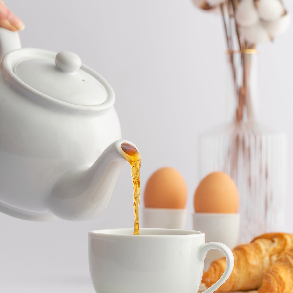White P & K Kensington teapot with a classic design, featuring a smooth body and a curved handle for serving tea.
