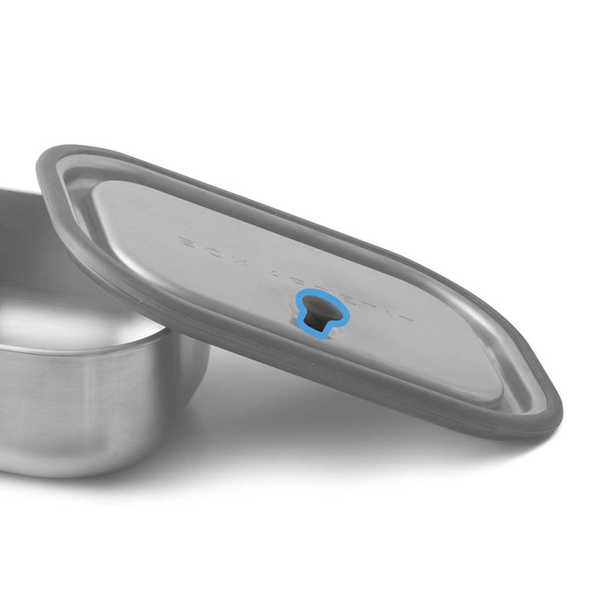 BLACK+BLUM stainless steel lunch box valve replacement part, showing the vent mechanism for secure sealing.