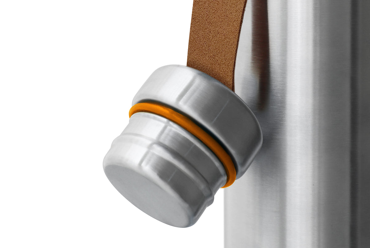 Black+Blum original insulated flask in black with stainless steel cap, designed for hot and cold beverage storage.