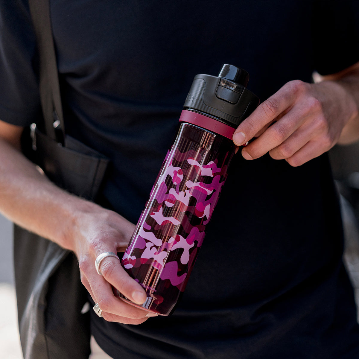 ALADDIN burgundy sports tracker water bottle with a secure lid, designed for active use and hydration.