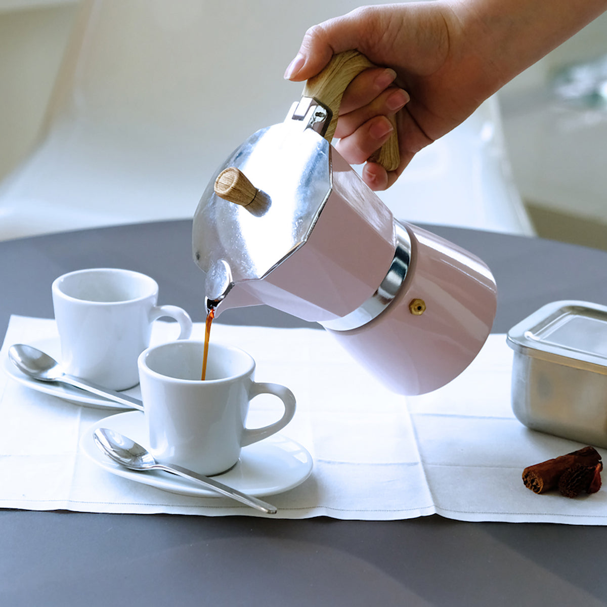 Pink GNALI & ZANI Venezia espresso maker, classic stovetop espresso pot with metallic finish, detailed with handle and spout.