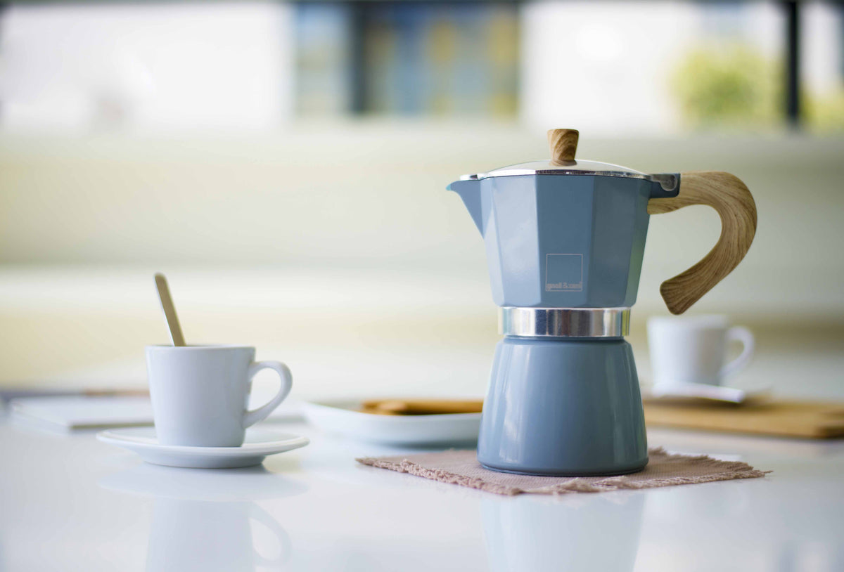 Blue GNALI & ZANI Venezia espresso maker with a classic stovetop design, made of durable metal for rich coffee brewing.