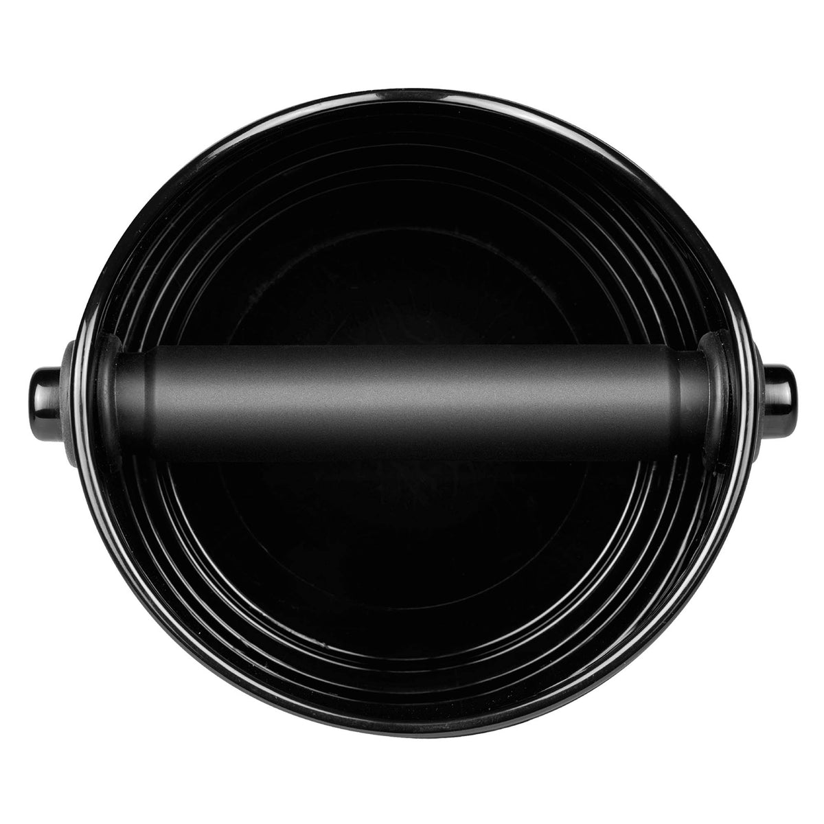 DREAMFARM Kaffeesatz-Behälter for coffee grounds, compact and durable container in a modern kitchen setting.
