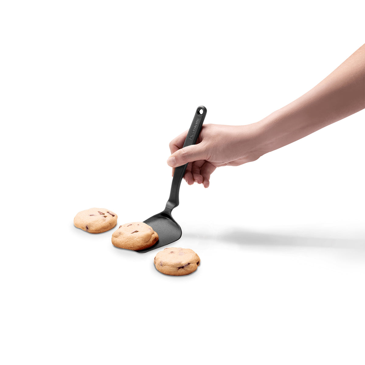 DREAMFARM mini kitchen spatula in black, flexible Küchenwender for cooking and flipping, with a compact design.