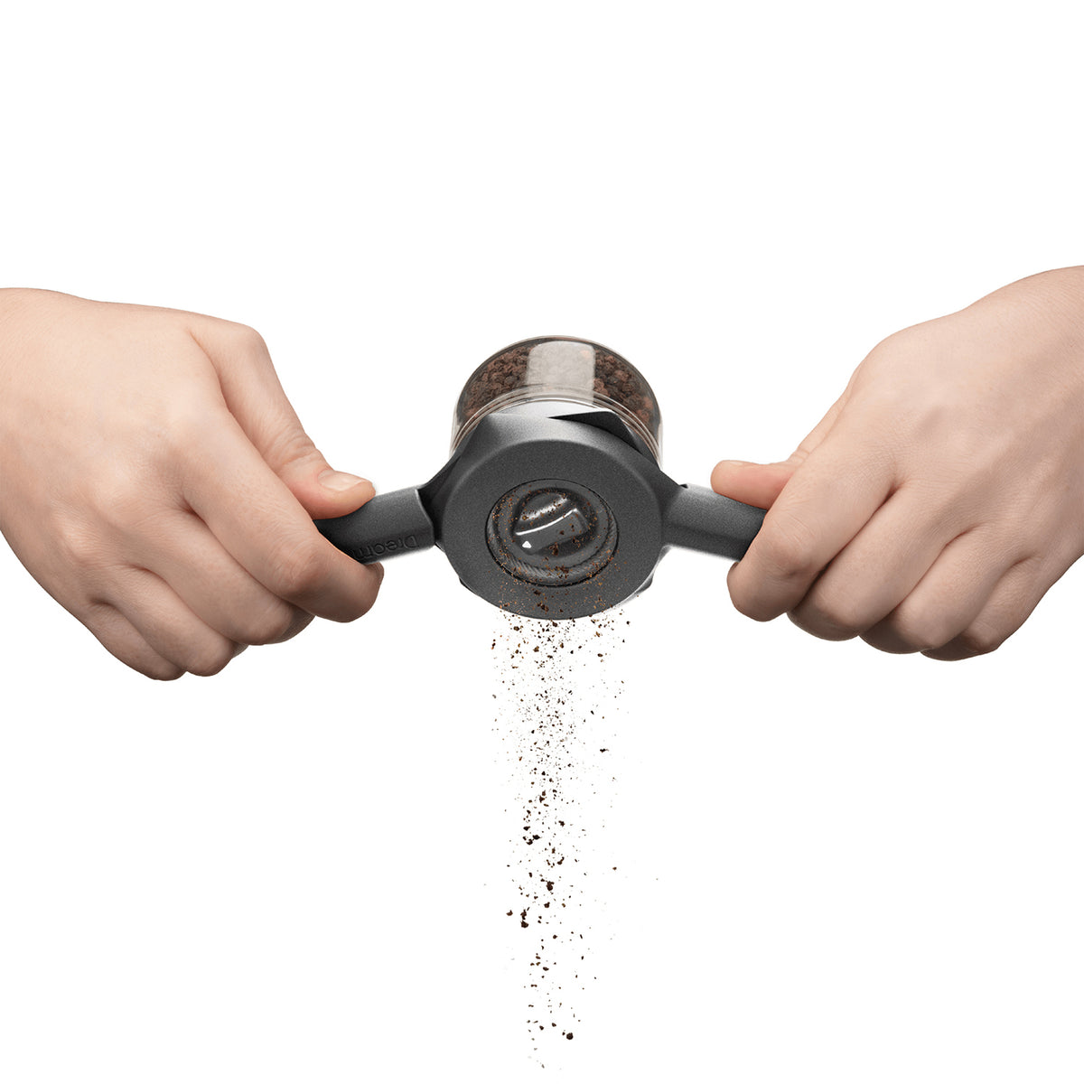 DREAMFARM ORTWO black spice grinder with a sleek modern design and textured surface for easy grinding.