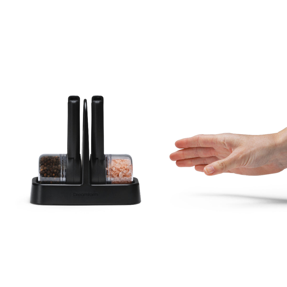 DREAMFARM ORTWO Lite black spice grinder set with two sleek, modern ceramic grinders on a white background.