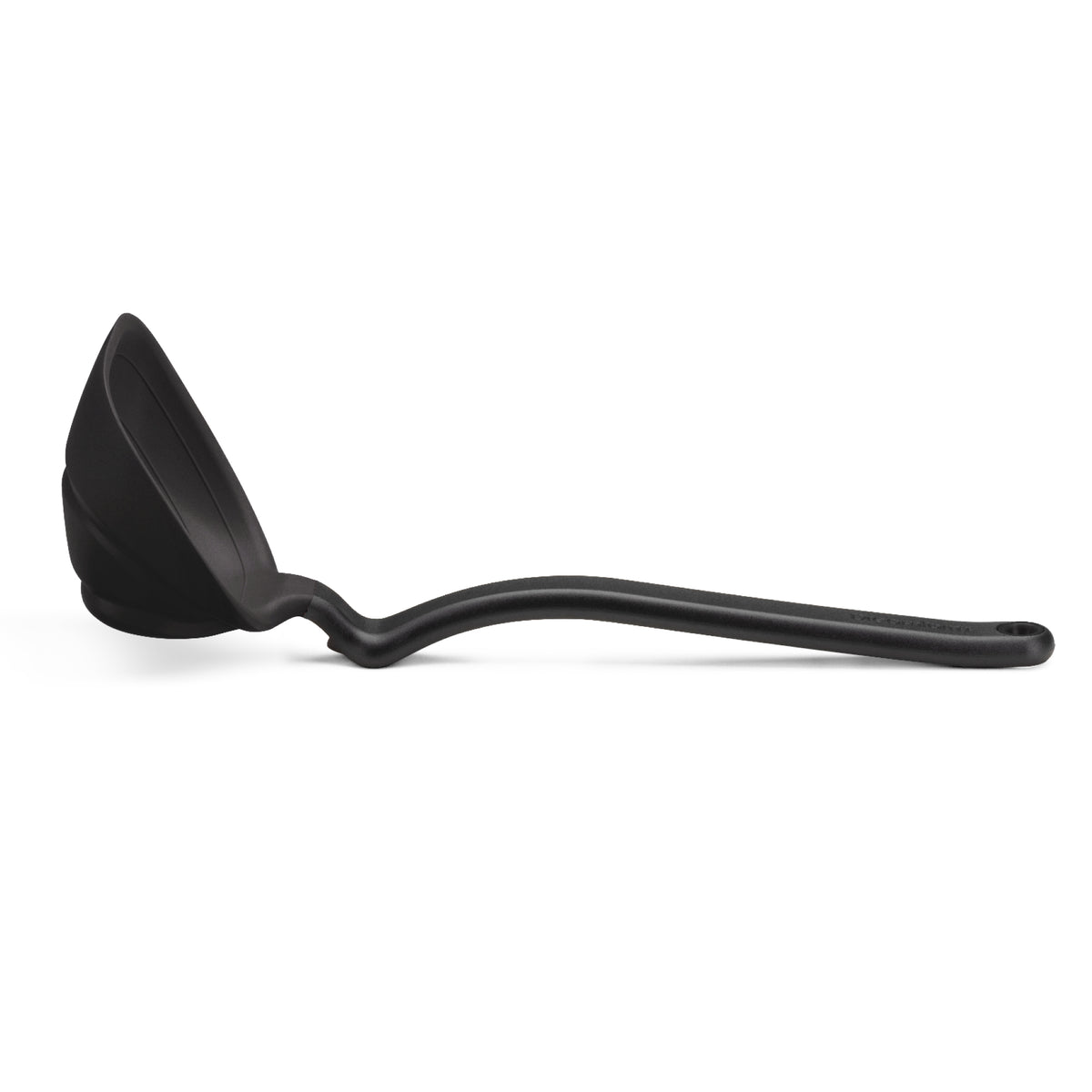 DREAMFARM red silicone ladle with a long handle for serving soups and stews in a modern kitchen setting.