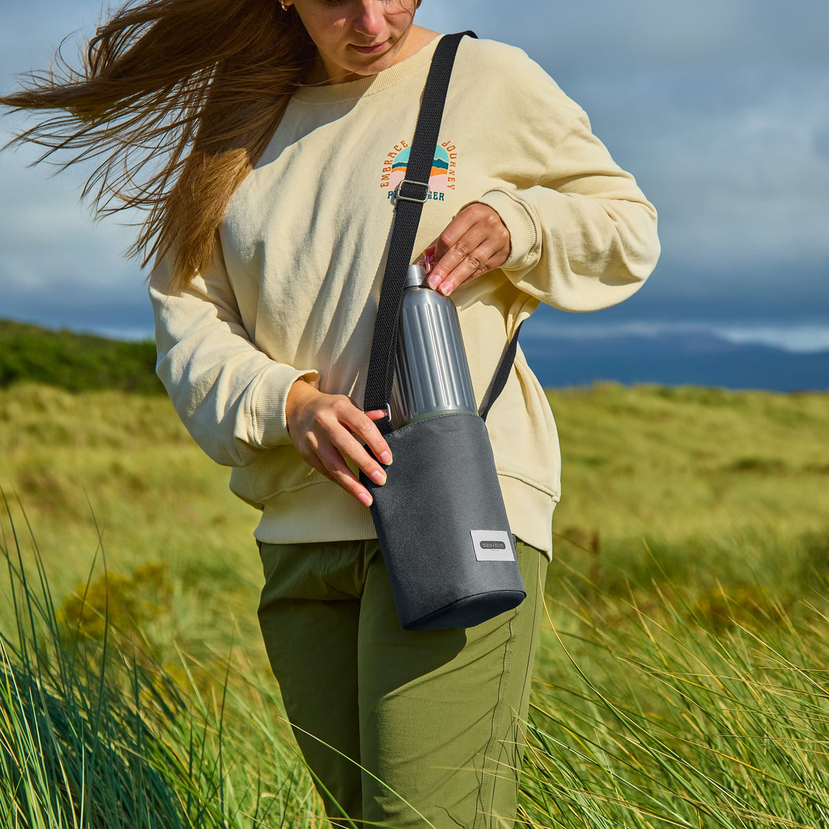 BLACK+BLUM slate-colored bottle bag with a sleek design, ideal for carrying explorer or beach bottles.