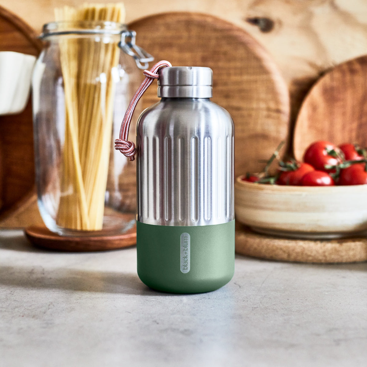 BLACK+BLUM Explorer insulated bottle in orange, 650ml, closed with a sleek design and durable construction.