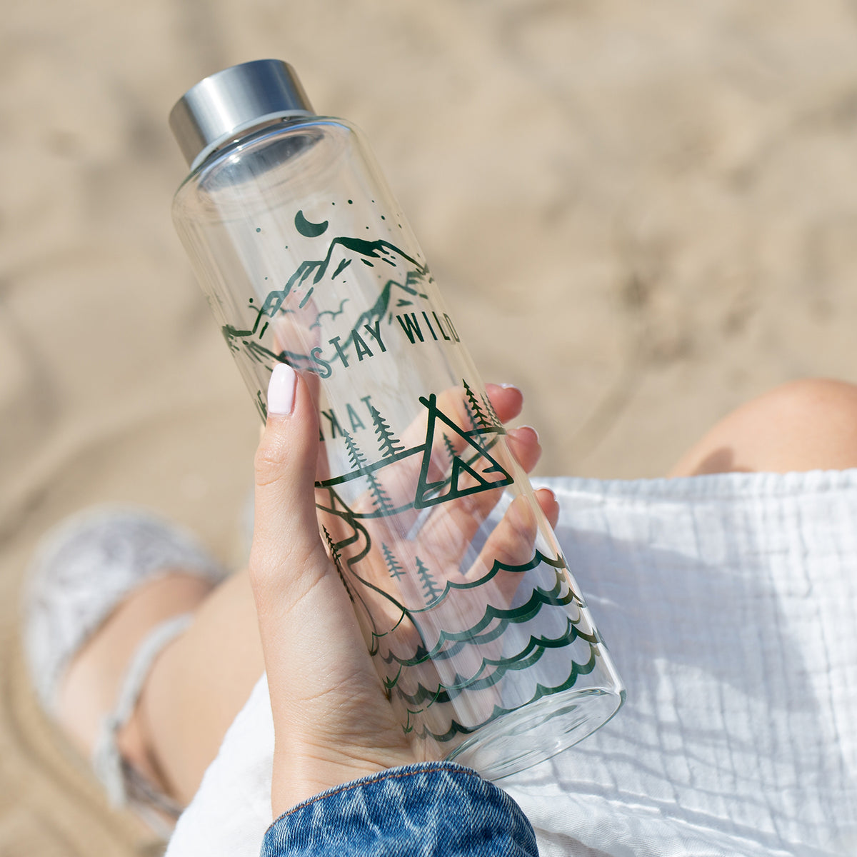 Glass water bottle from Typhoon's PURE Stay Wild collection, 600 ml capacity with a clear, durable design.