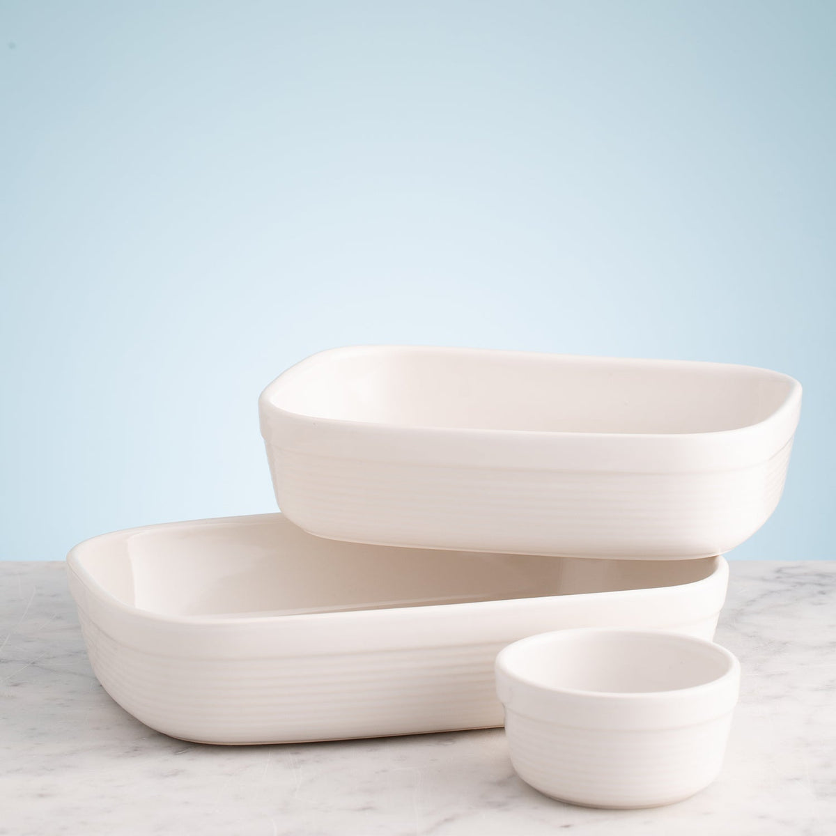 Gray William Mason Cash small rectangular baking dish with 1.4-liter capacity and slight glaze imperfections.