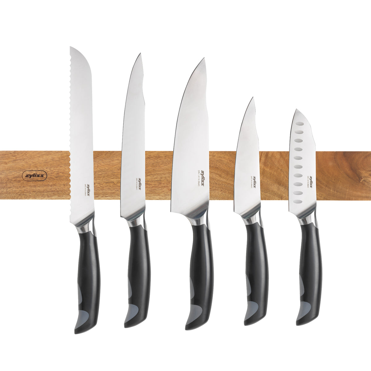 Wooden magnetic knife strip from Zyliss for organizing and displaying kitchen knives securely on the wall.