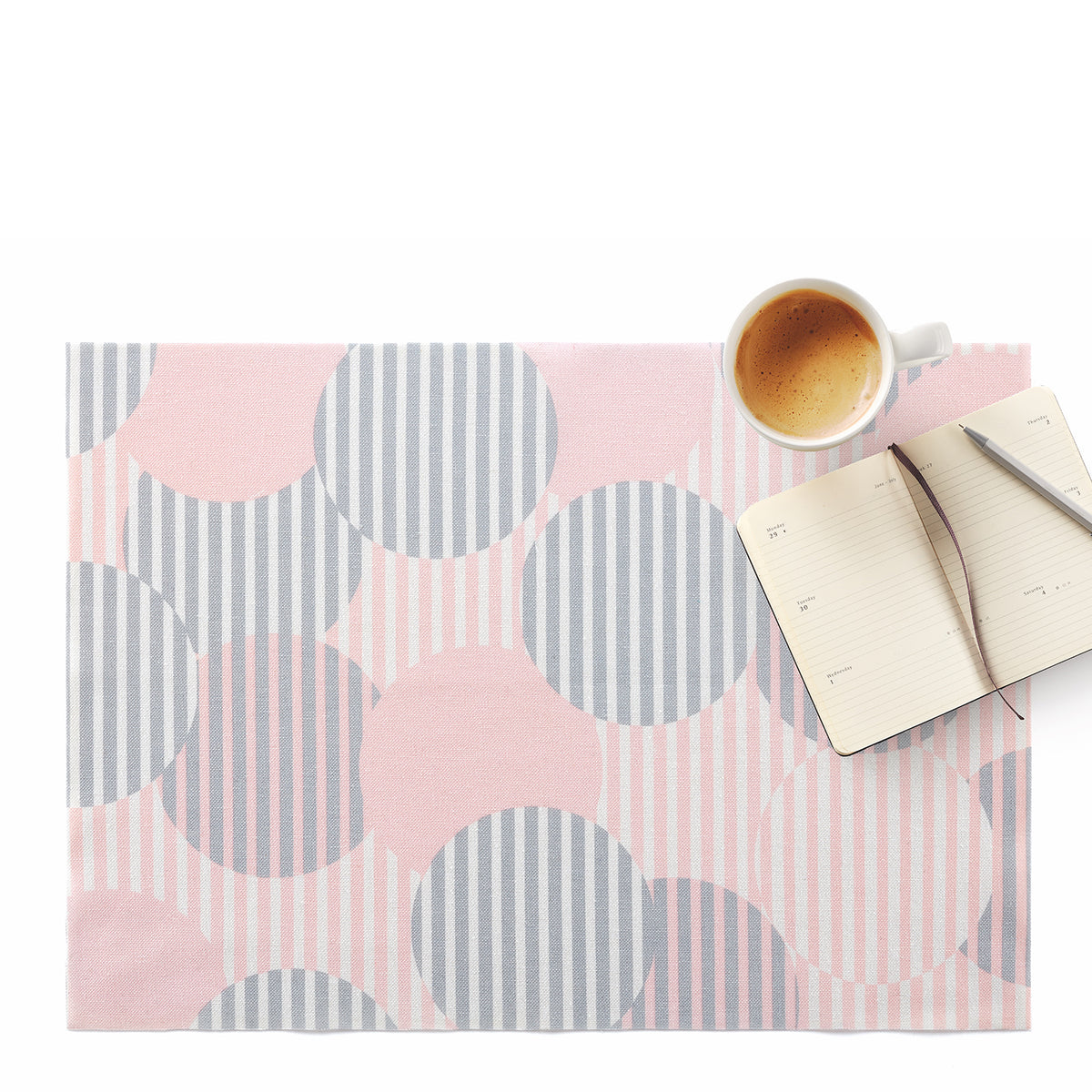 Pink polka dot table placemats with lotus effect from DAY DRAP, set of two, featuring a stylish design and water-repellent surface.