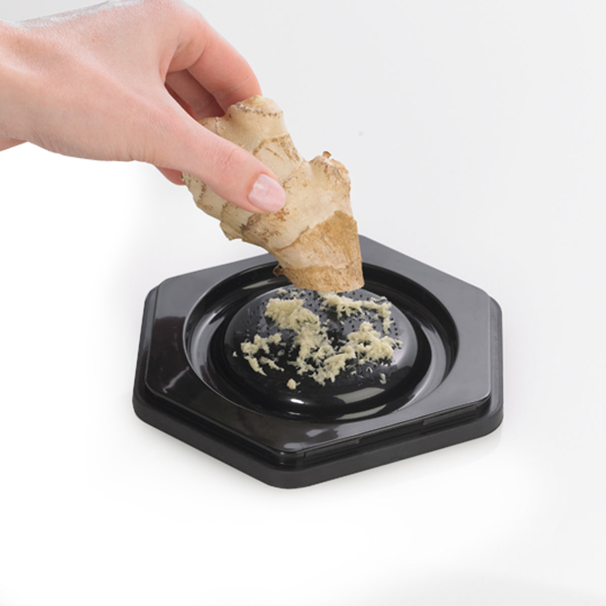CUISIPRO 7-in-1 Küchenreibe stainless steel multi-purpose grater with various blades for slicing, shredding, and zesting.