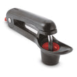 CUISIPRO cherry and olive pitter in black, with ergonomic handle and stainless steel parts for easy pitting of fruits and olives.