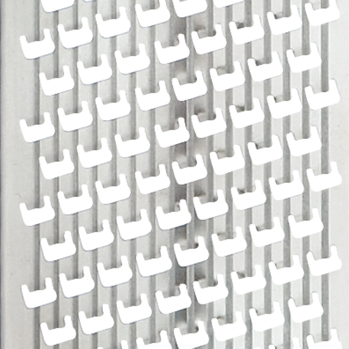 CUISIPRO fine black 29cm Kronenreibe grater with textured surface for cheese, zest, or spices on a neutral background.