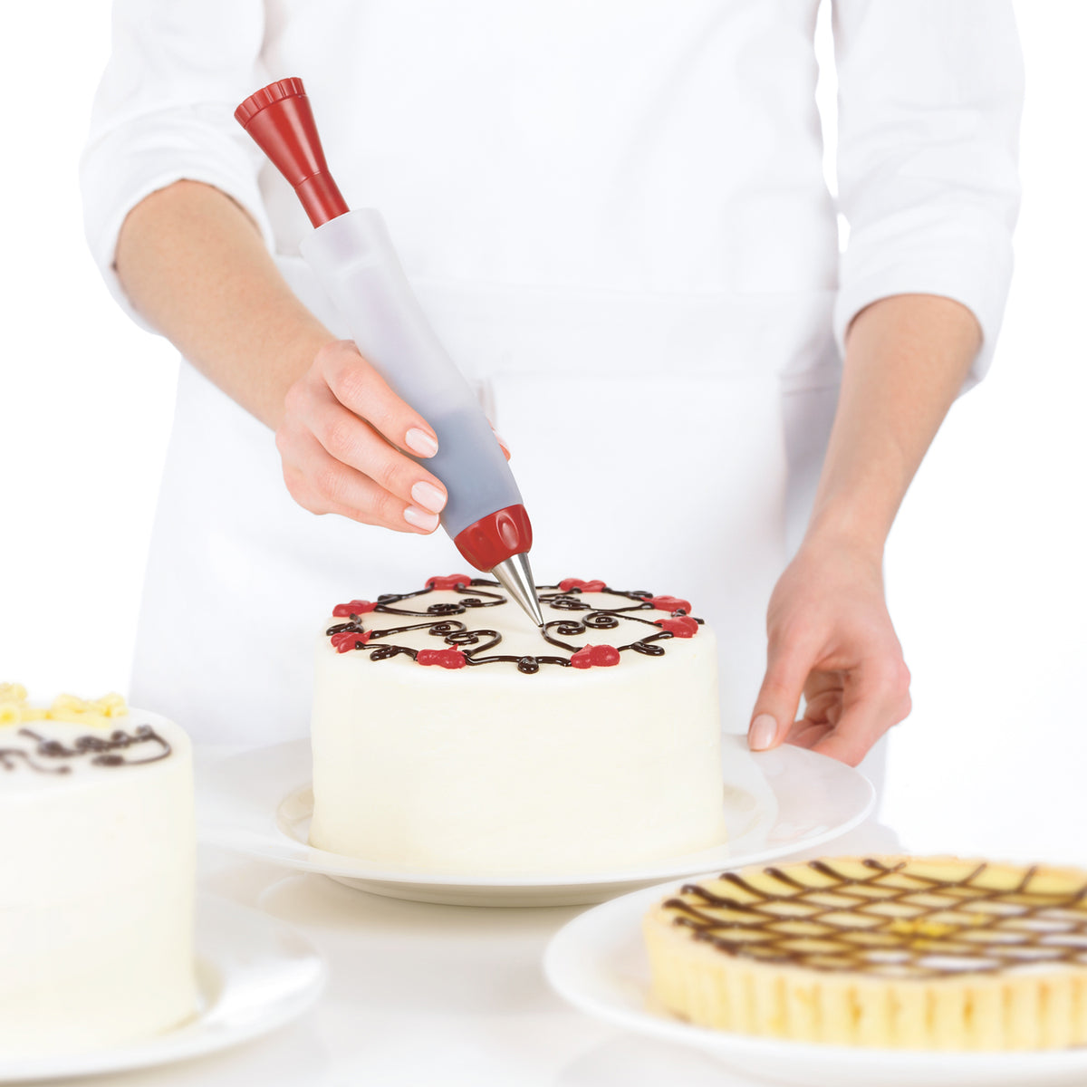 CUISIPRO decoristift in red and white, designed for cake decorating and pastry embellishments.