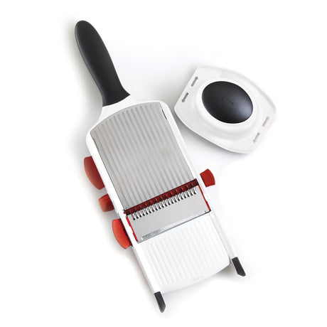 White CUISIPRO Hobel SGT woodworking plane showing the blade and handle for smooth wood shaping.