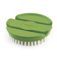 Red CUISIPRO vegetable brush, 9 cm long, with sturdy bristles for cleaning vegetables and produce effectively.