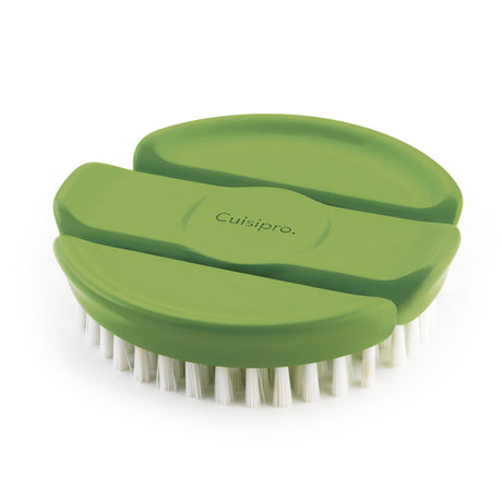 Red CUISIPRO vegetable brush, 9 cm long, with sturdy bristles for cleaning vegetables and produce effectively.