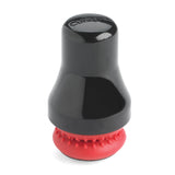 CUISIPRO Fleckenentferner Magnet in schwarz rot, designed for removing stubborn stains from fabrics and surfaces.