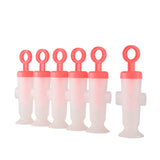CUISIPRO Eisformen-Set in Koralle, 6 Stück, flexible silicone molds for making colorful ice cubes or frozen treats.
