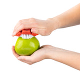 Red CUISIPRO vegetable brush, 8.25 cm, with bristles for cleaning vegetables and fruits effectively.