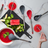 Gray CUISIPRO Elegance cooking spoon, 30.5 cm long, with a sleek design suitable for kitchen use.