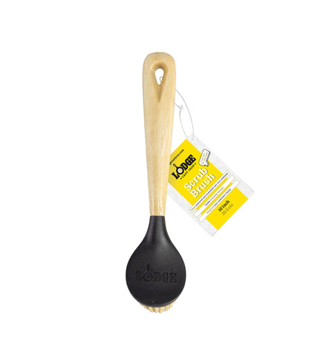 Brown LODGE brush with natural bristles, designed for grooming and styling hair, showcasing a sleek, ergonomic handle.