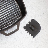 Lodge black and red grill pan scrapers, 2-piece set, with metal handles for easy cleaning of cast iron grill pans.