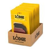 Lodge black and red grill scraper with handle, designed for cleaning barbecue grills and grates.
