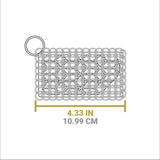 Lodge silicone and steel scrub pad in red, durable kitchen cleaning tool with textured surface for scrubbing cookware.