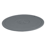 Gray Lodge coaster set with four round cork-backed drink coasters on a wooden surface.