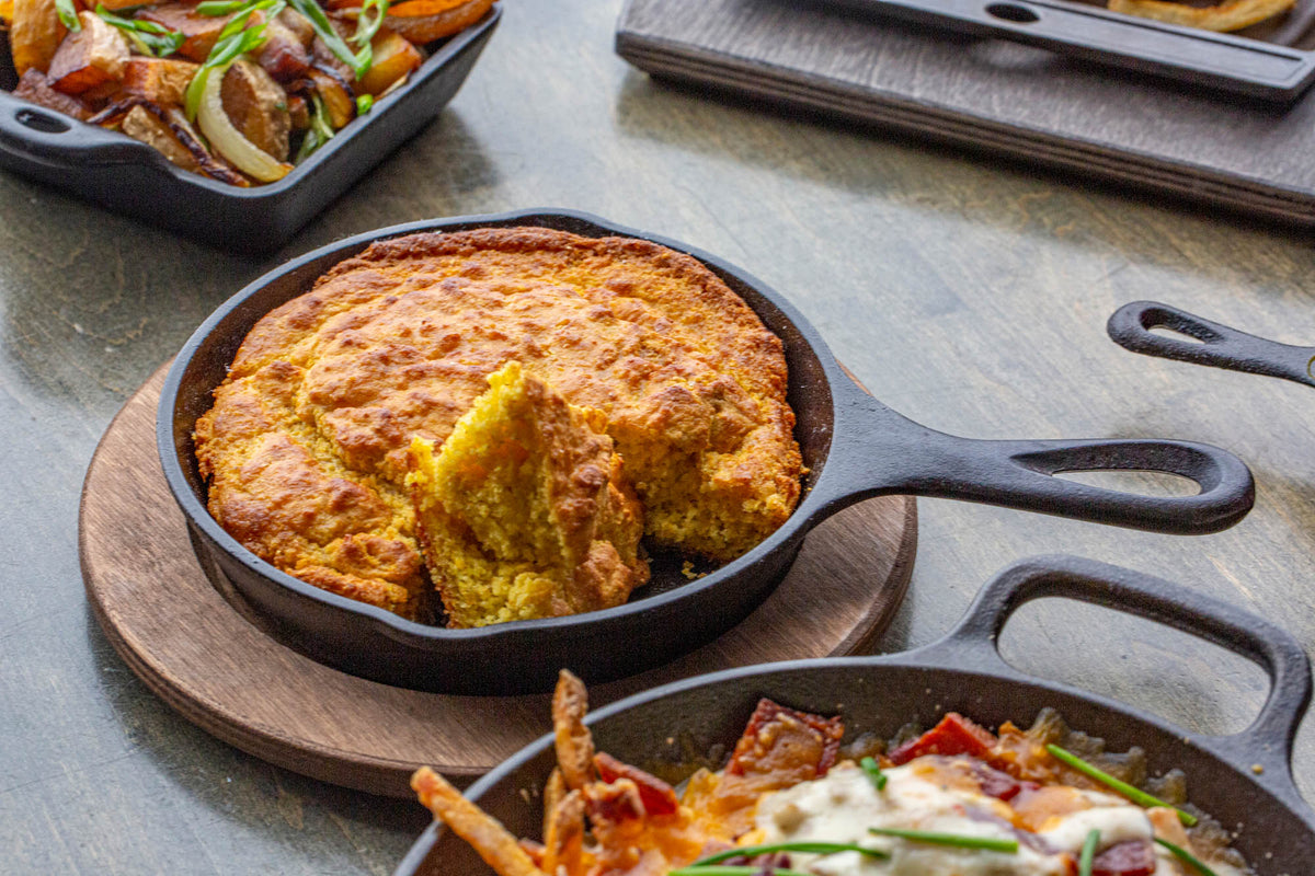 Black Lodge Classic cast iron skillet showing a smooth cooking surface and sturdy handle for versatile stovetop use.