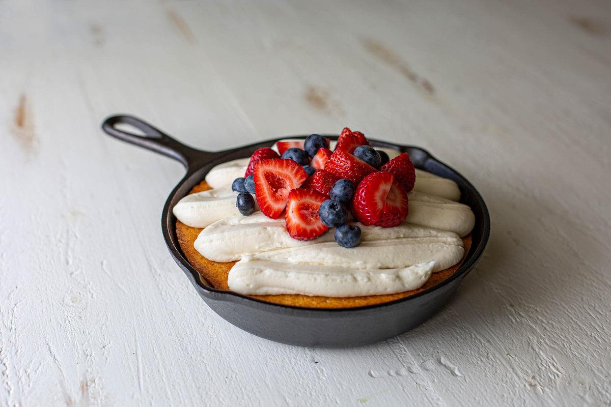 Lodge Classic black cast iron skillet showing a smooth cooking surface and sturdy handle for versatile stovetop use.