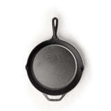 Lodge classic black cast iron skillet for cooking, with a smooth handle and sturdy construction, suitable for stove and oven use.