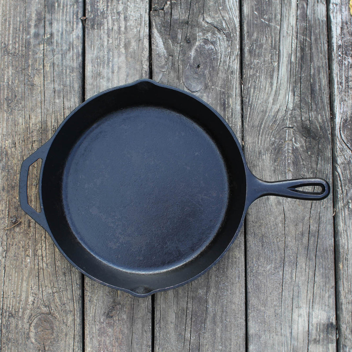 Lodge Classic cast iron skillet in black, showing a sturdy, seasoned cooking surface and handle for versatile kitchen use.