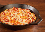 Lodge Classic cast iron skillet in black, showing smooth cooking surface and sturdy handle for versatile kitchen use.