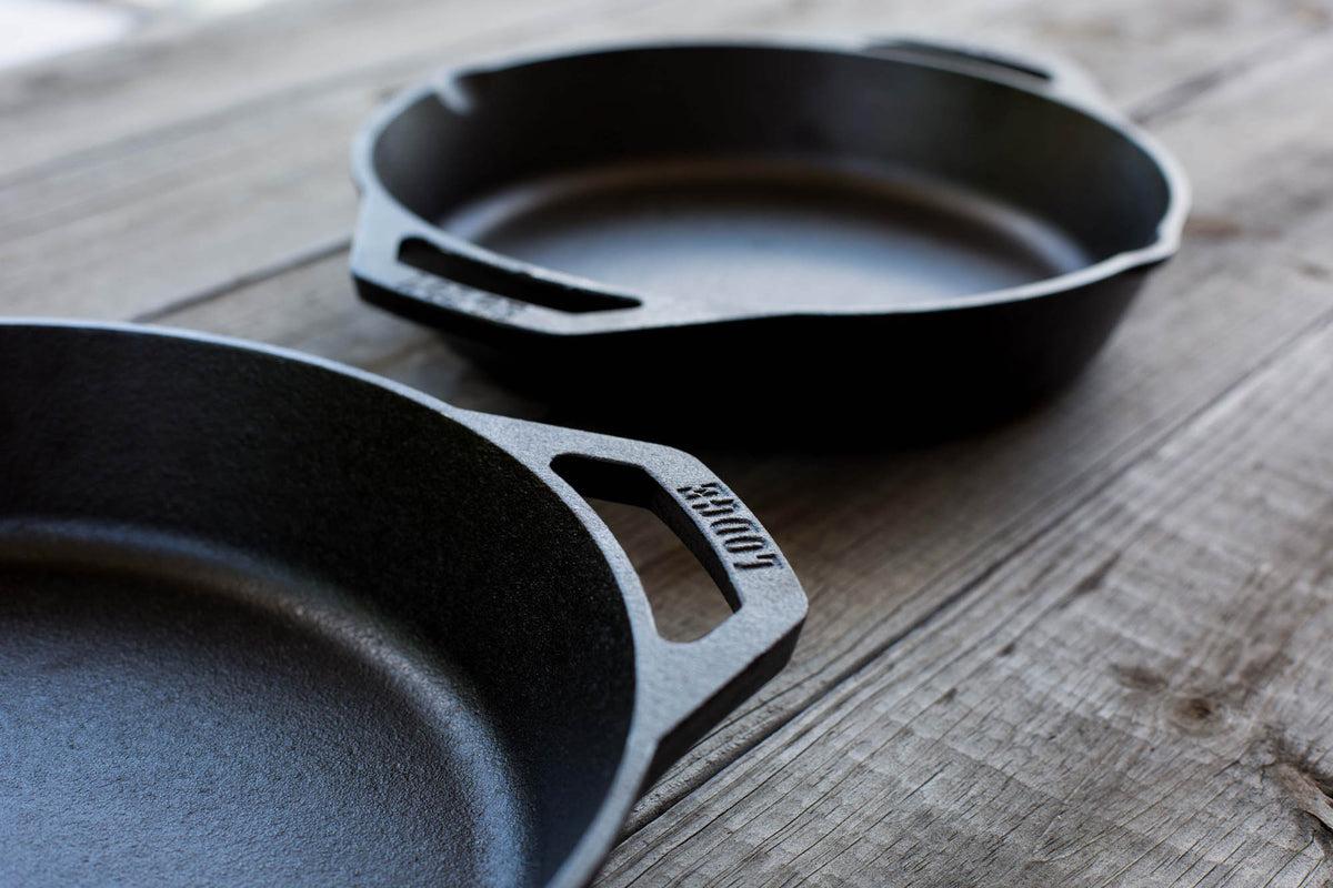 Lodge Classic black cast iron skillet showing its smooth cooking surface and sturdy handle, ideal for versatile stovetop cooking.