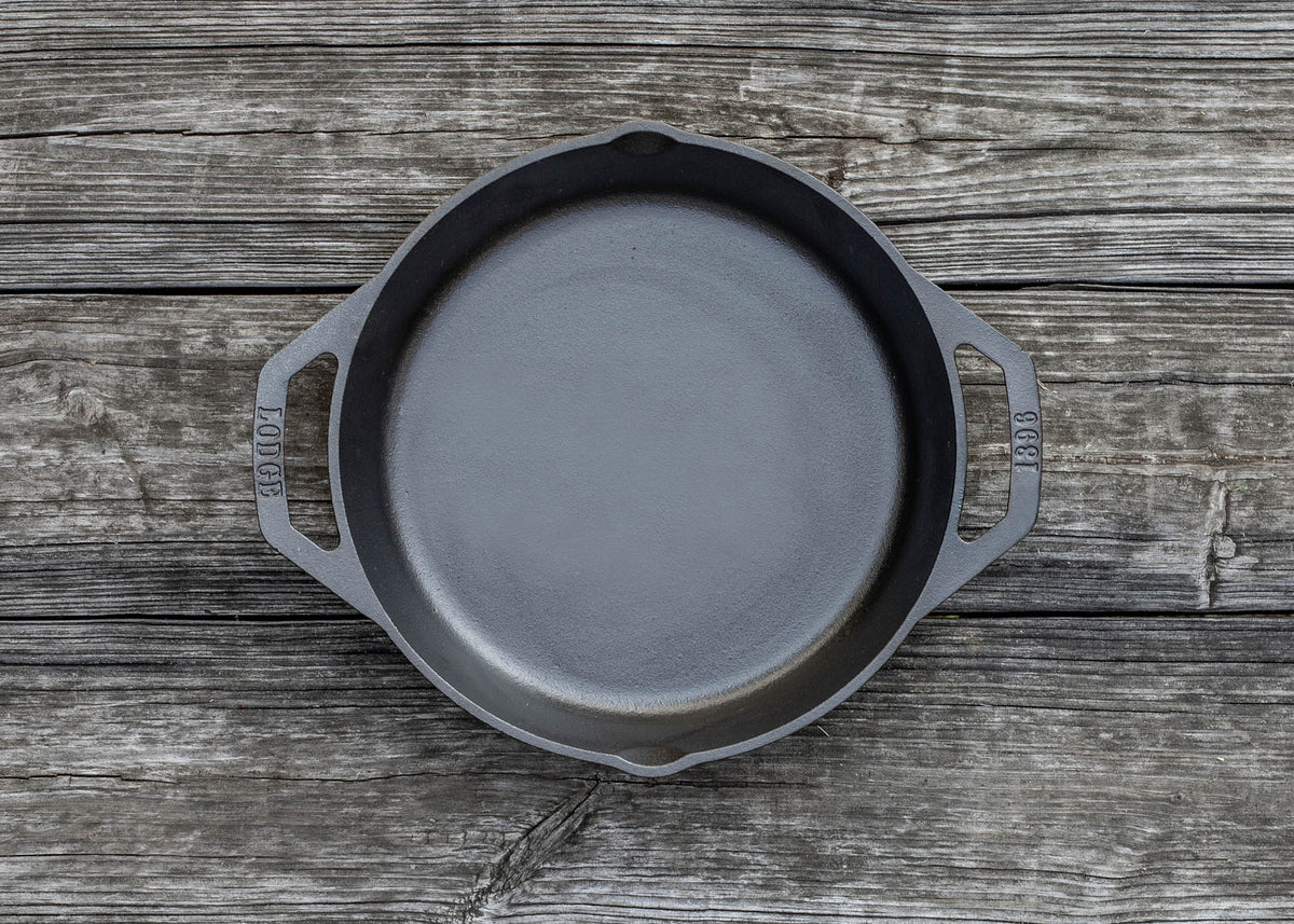 Lodge classic black cast iron skillet pan with handle, designed for versatile cooking and heat retention