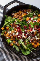 Lodge classic black cast iron skillet pan with a sturdy handle, perfect for versatile cooking and even heat distribution.