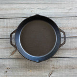 Lodge Classic black cast iron skillet showing smooth cooking surface and sturdy handle for versatile kitchen use.