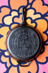 Black Lodge Classic cast iron skillet with handle and cooking surface, ideal for versatile stovetop and oven use.