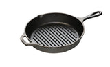 Lodge Classic black cast iron grill pan with 25.4 cm diameter, shown with textured cooking surface and sturdy handle.