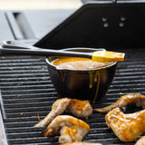 Lodge Classic black melting pot, 13.3 cm, made of durable material, ideal for melting and mixing ingredients.