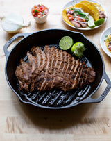 Lodge Classic black double-handle grill pan, 30.5 cm, made of durable cast iron with ribbed cooking surface for grilling.