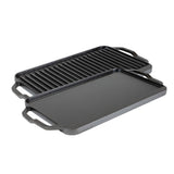 Lodge 2-sided cast iron grill plate with smooth and ridged surfaces, 50.8 cm x 25.4 cm, ideal for grilling and searing.