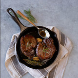 Lodge Chef black cast iron skillet pan with handle, ideal for cooking on stovetop or oven, durable and heavy-duty cookware