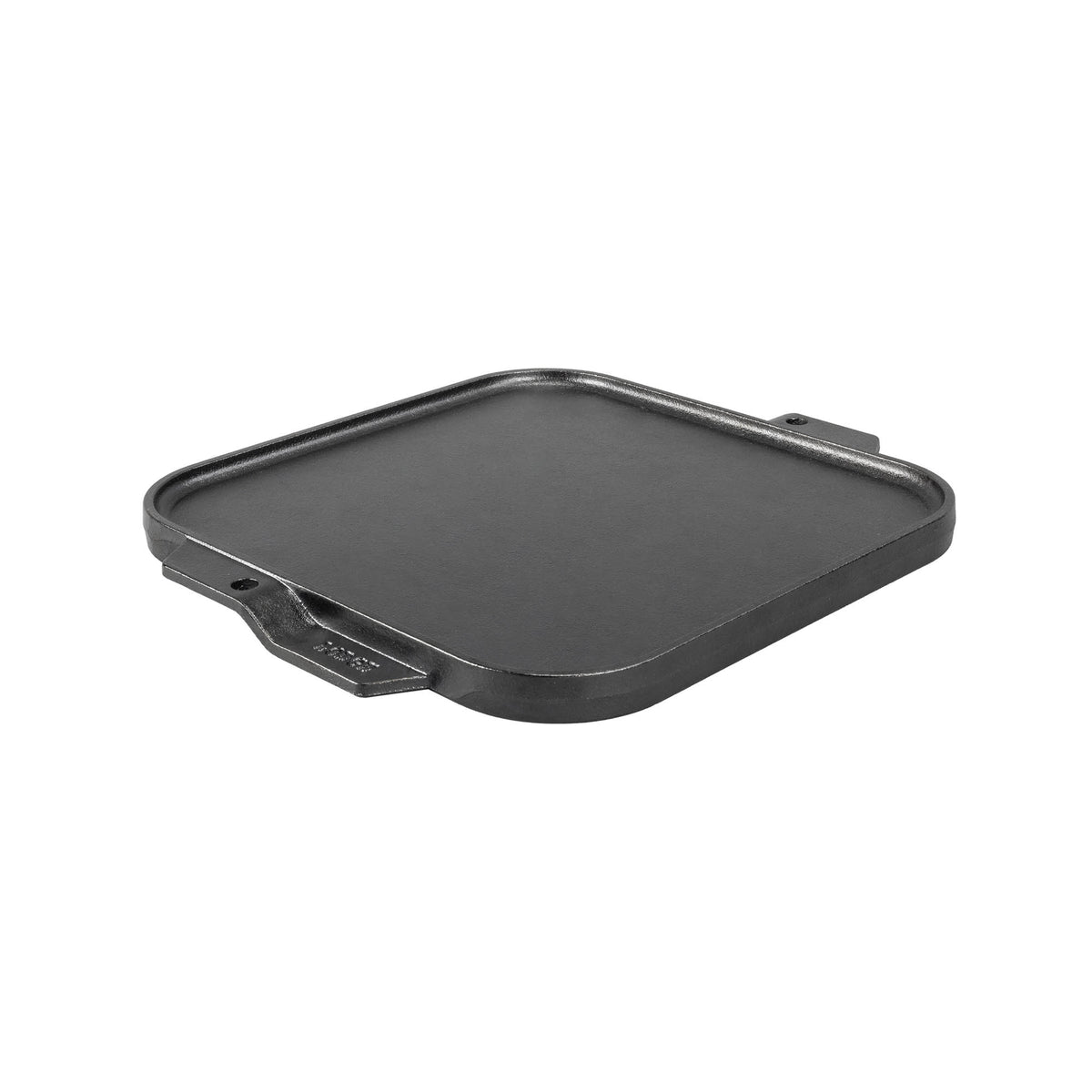 Lodge Classic black two-sided flat and ridged grill plate for outdoor cooking, featuring a durable cast iron surface.