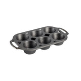 Lodge classic black muffin pan with multiple muffin cups, durable non-stick bakeware for baking muffins and cupcakes.